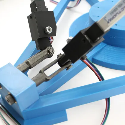 A close-up of a delta-robot joint mechanism