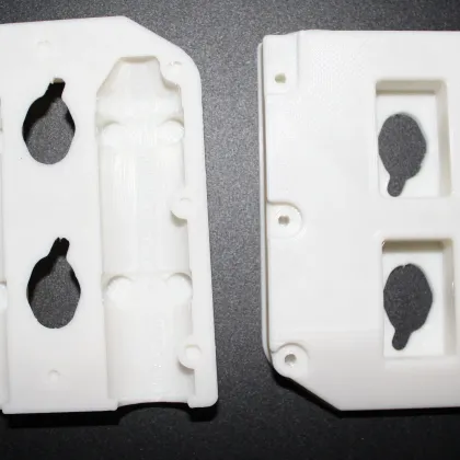 A two-part white enclosure case, 3D-printed and assembled