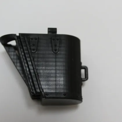 A black enclosure housing part, alternate angle